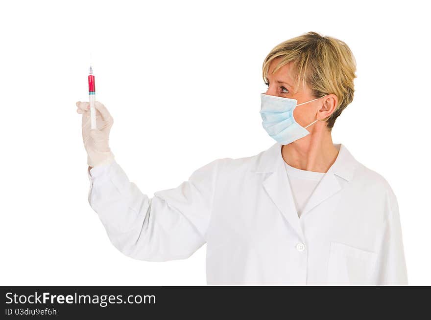 Female doctor with mask holding a syringe in white background