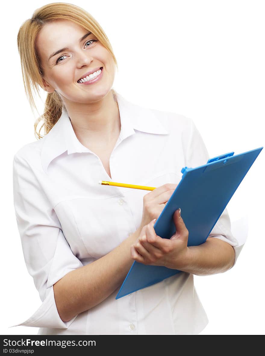 Young pretty woman standing and holding blue tablet with pencil