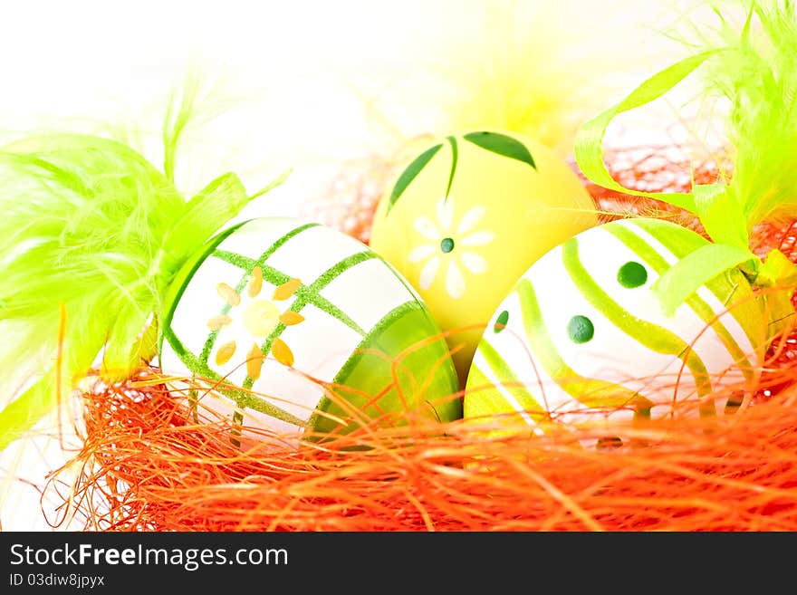 Painted eggs on orange background. Painted eggs on orange background.