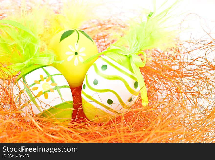 Painted eggs on orange background. Painted eggs on orange background.