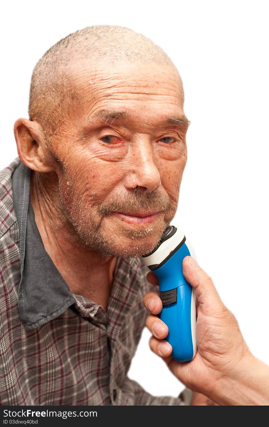 Son shaving his old fathers face isolated on white