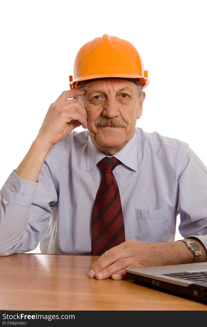 Engineer at the computer isolated on white background