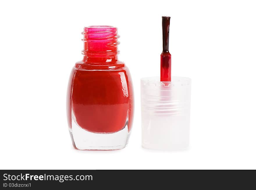 Red nail polish on a white background