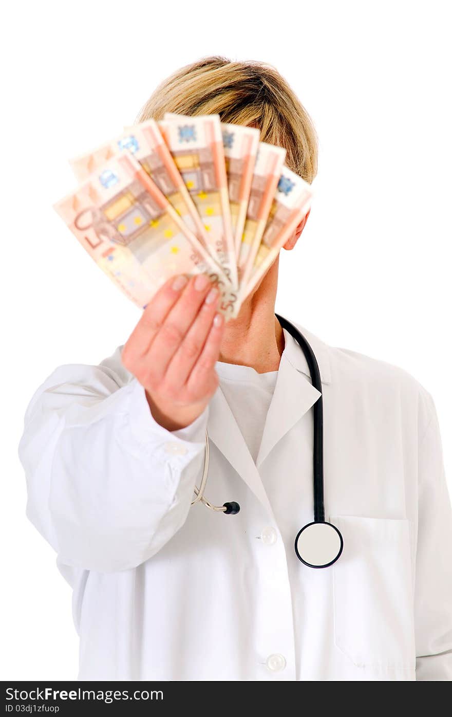 Female doctor holding banknotes in white background