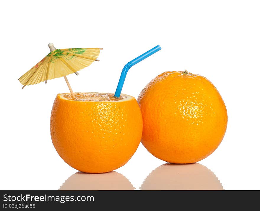 Orange as a drink with a straw and umbrella