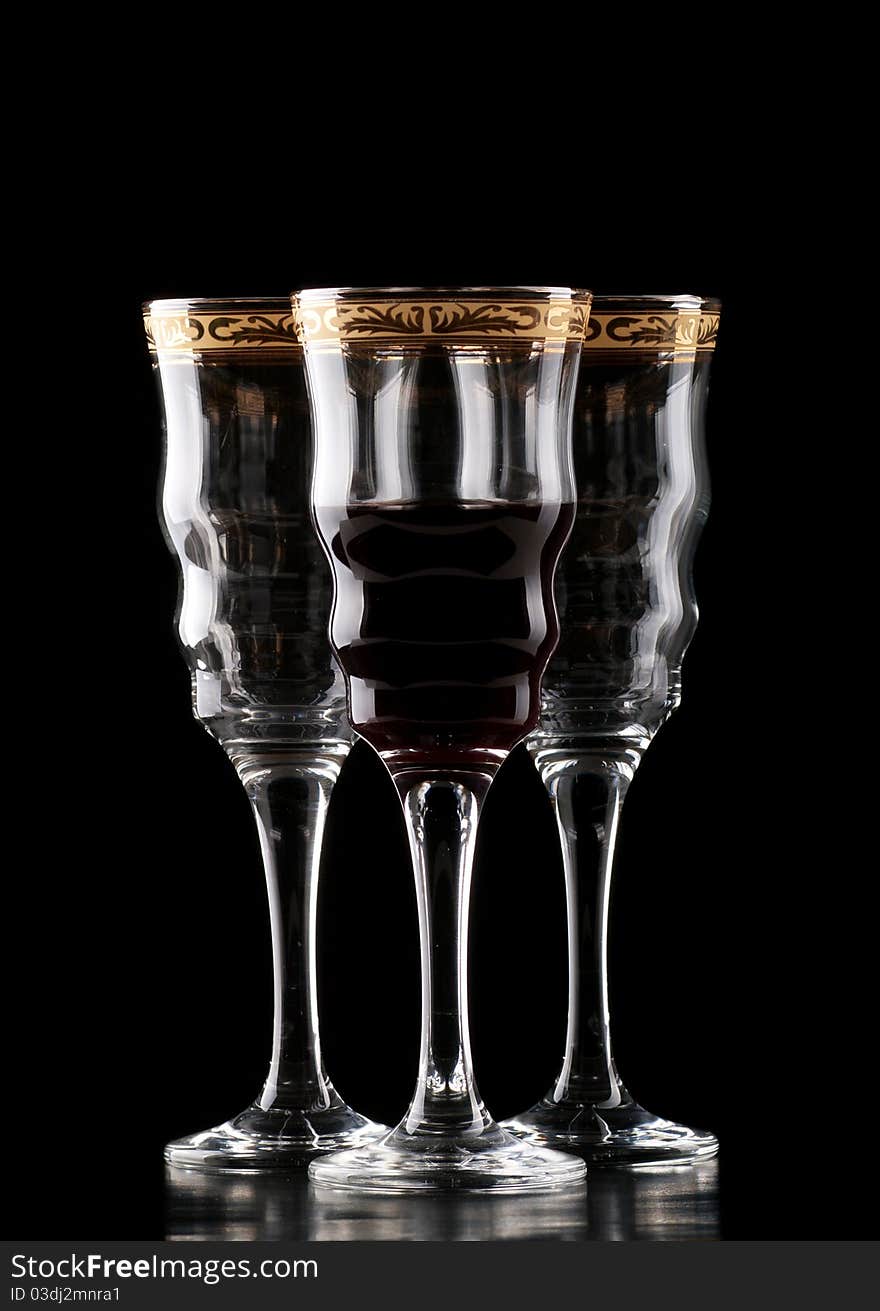 Three wineglass isolated on black