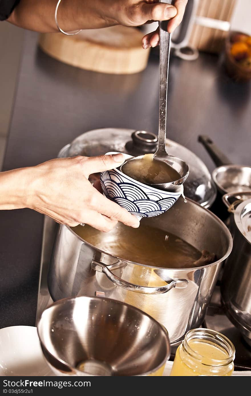 Served out soup from a pot