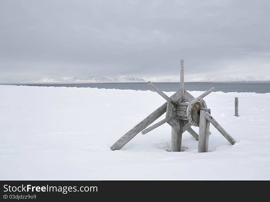 Svalbard - Very Old Wooden Equipment On The Shore