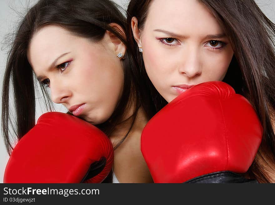 Studio shot of young female boxer