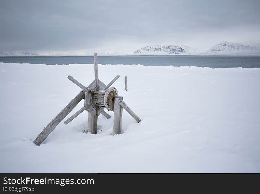 Svalbard - very old wooden equipment on the shore