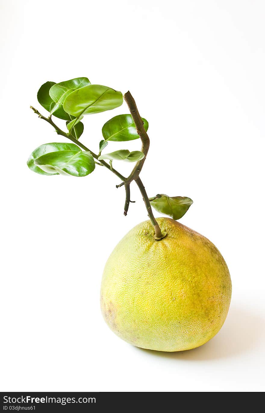 Pomelo fruit with leaves isolated on white background