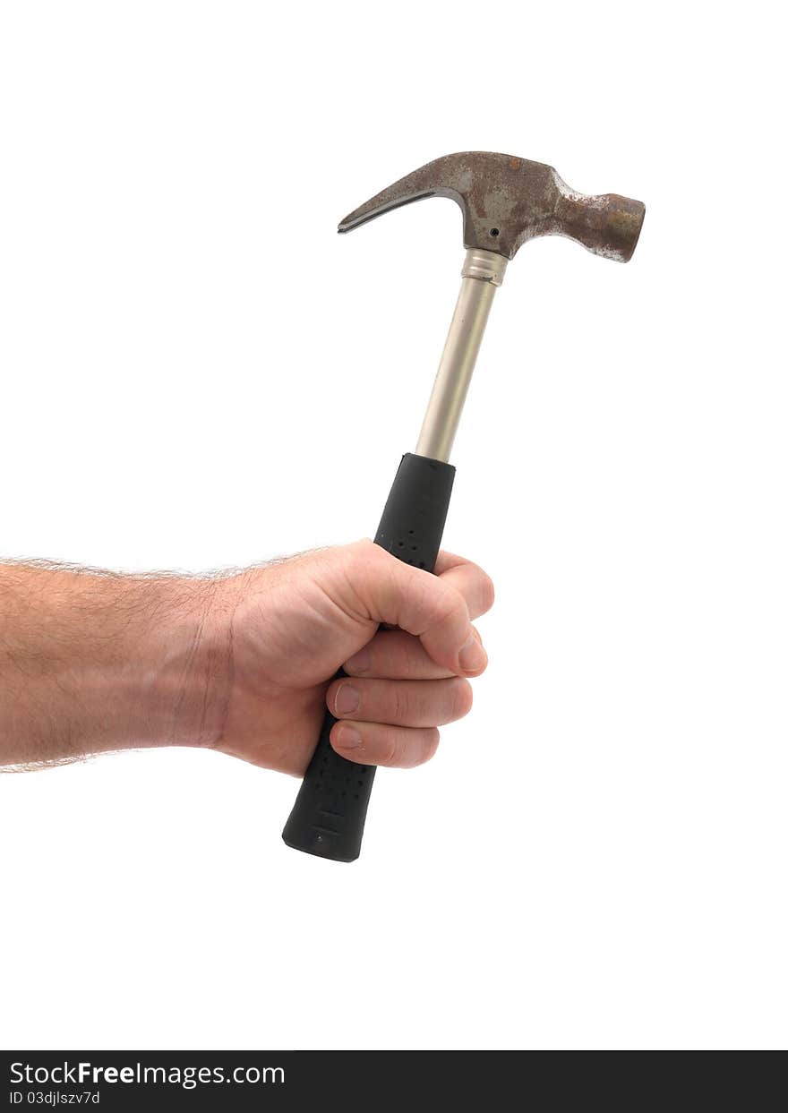 A metal hammer in hand isolated against a white background. A metal hammer in hand isolated against a white background