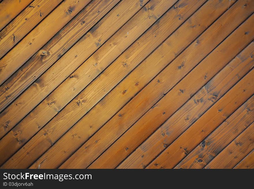 Brown wooden board, can be used as a background. Brown wooden board, can be used as a background