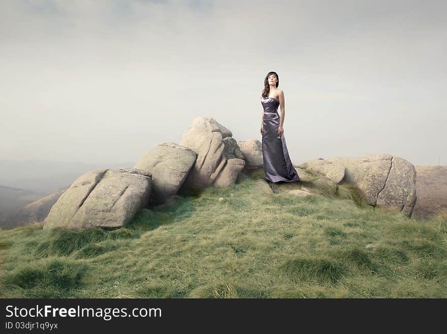 Beautiful woman on a hill. Beautiful woman on a hill