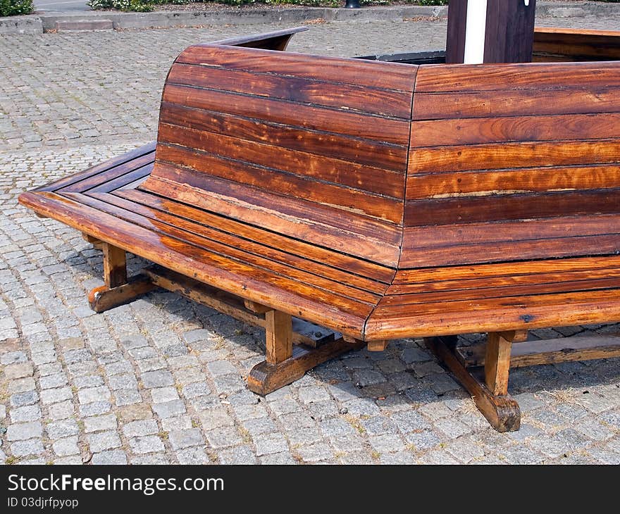 Classical design beautiful wooden bench in a park