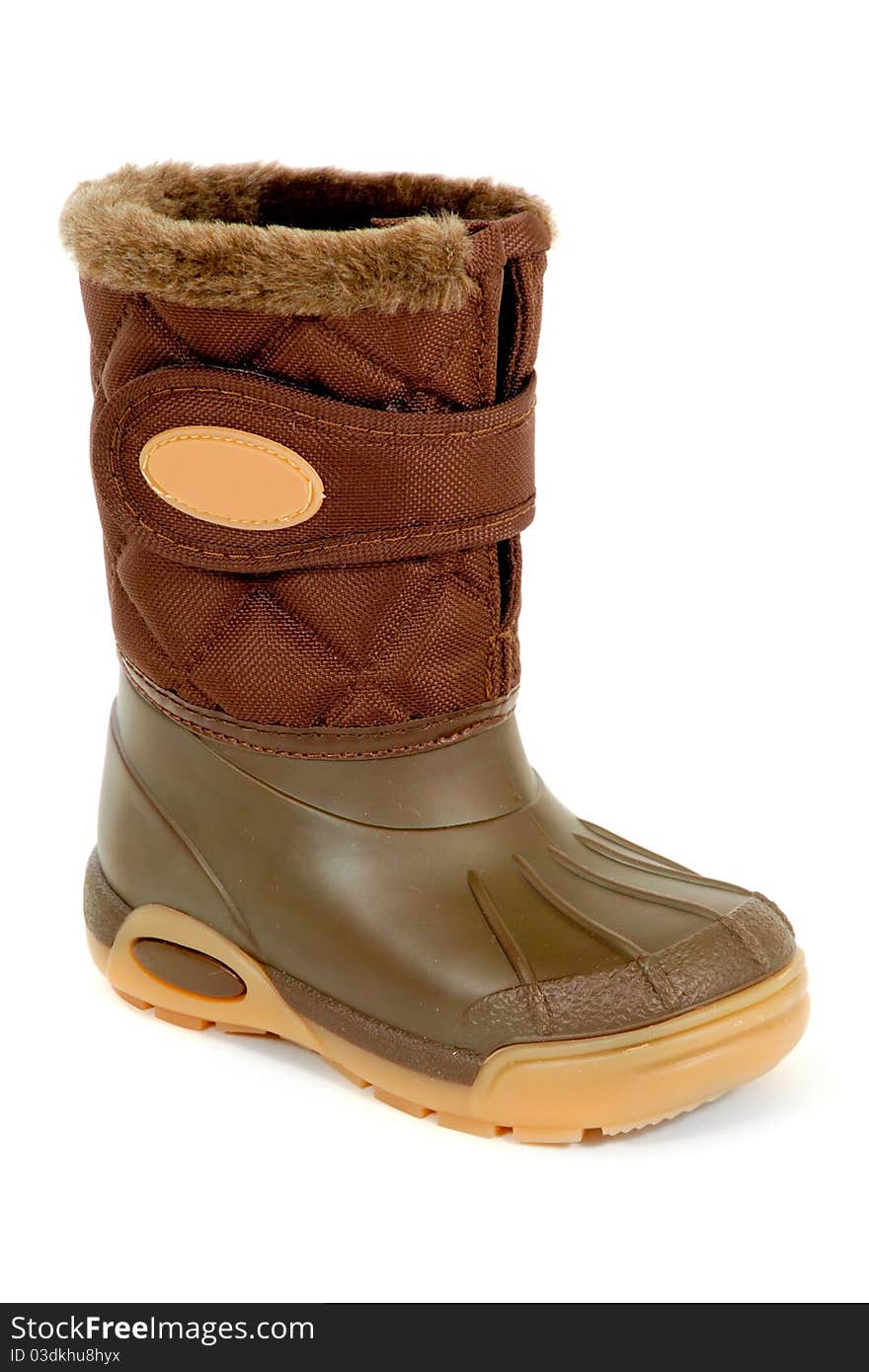 A green and brown winter boot taken on a white background.