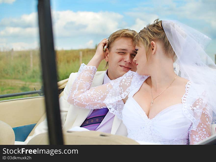 Bride and groom hugging