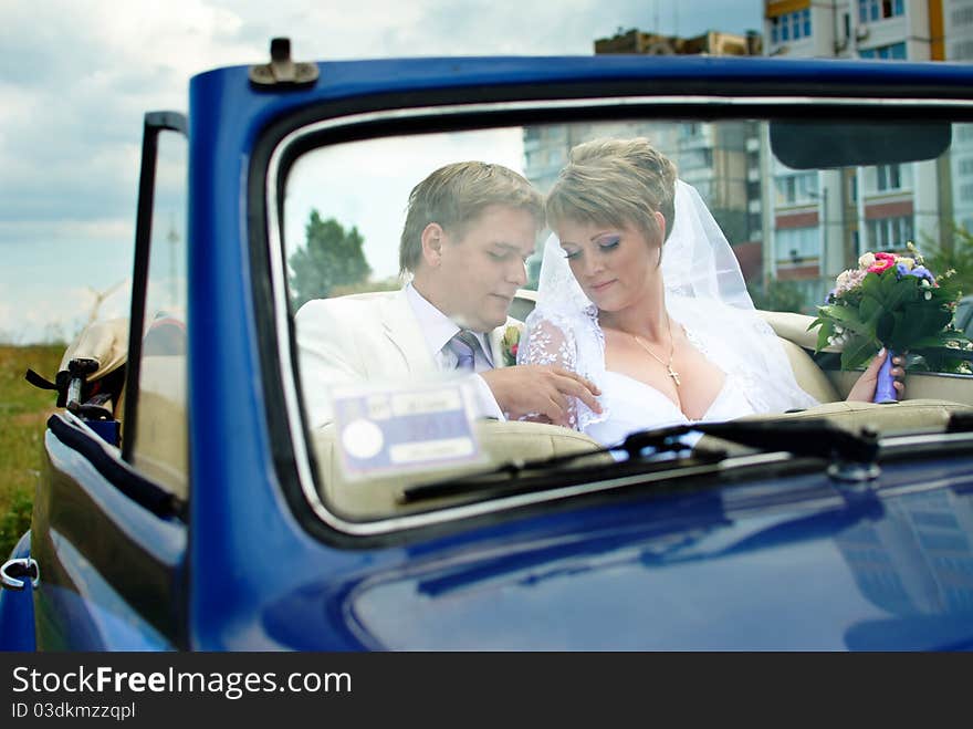 Bride and groom hugging