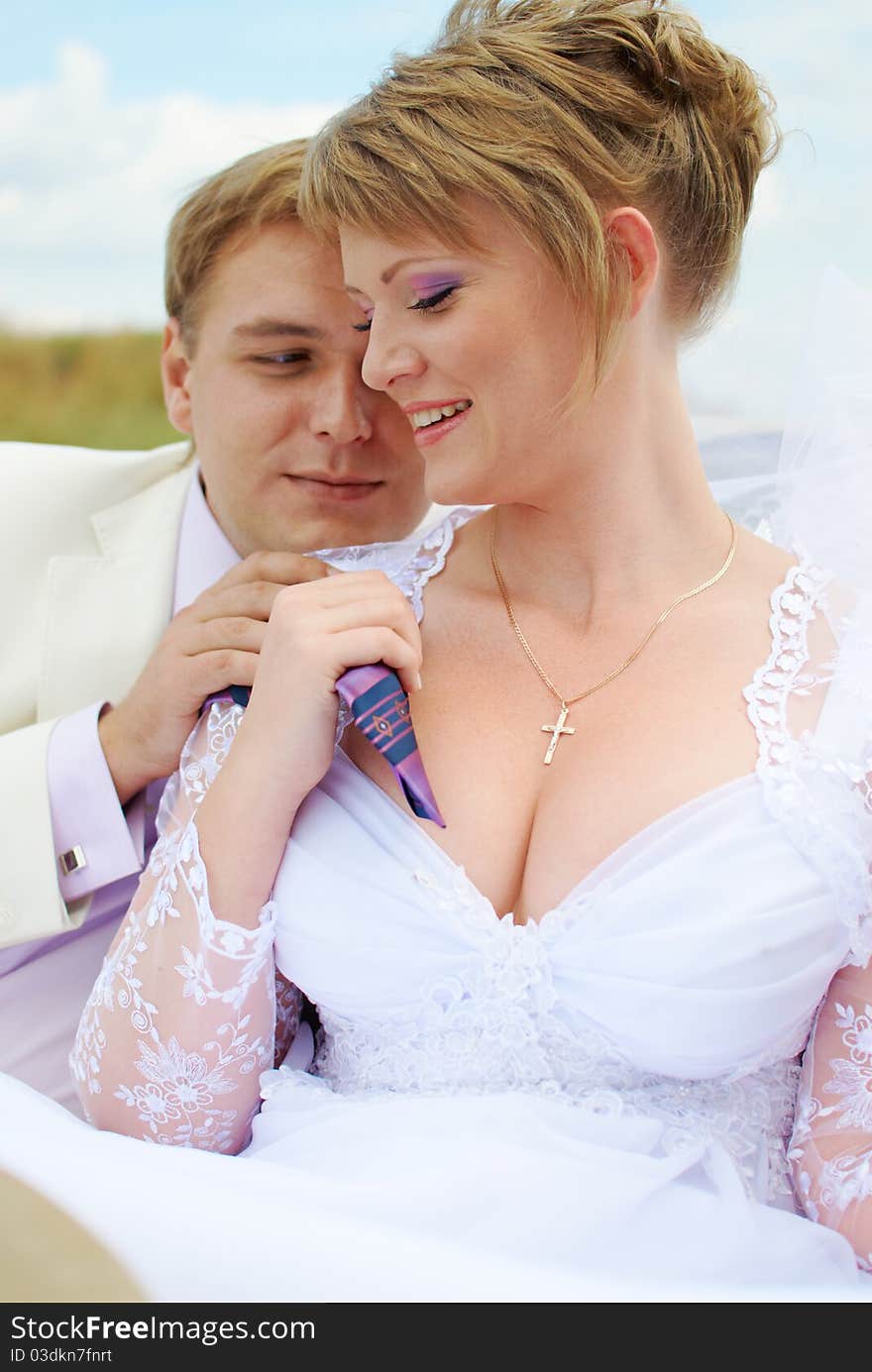 Bride and groom hugging