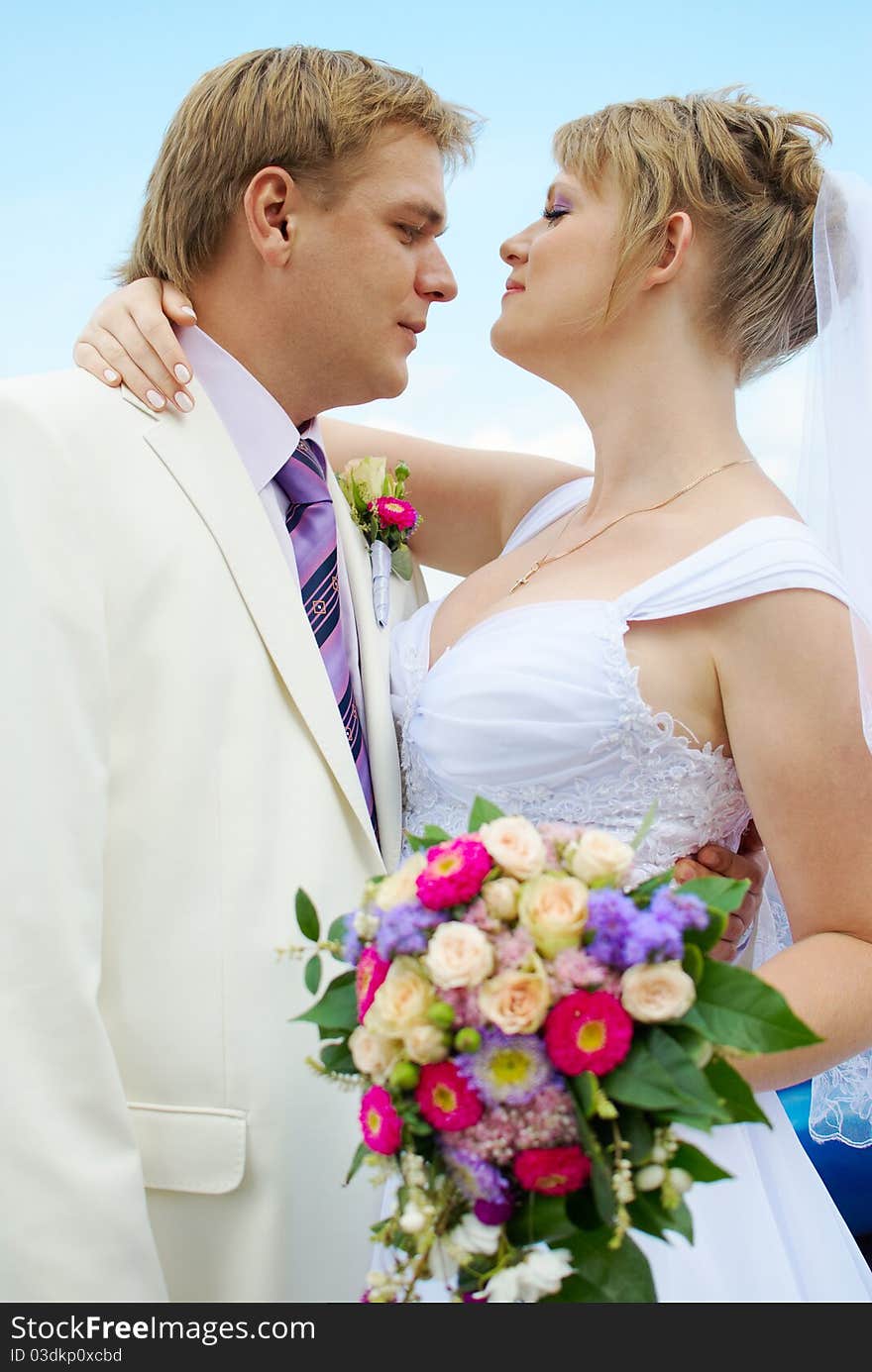 Bride and groom hugging