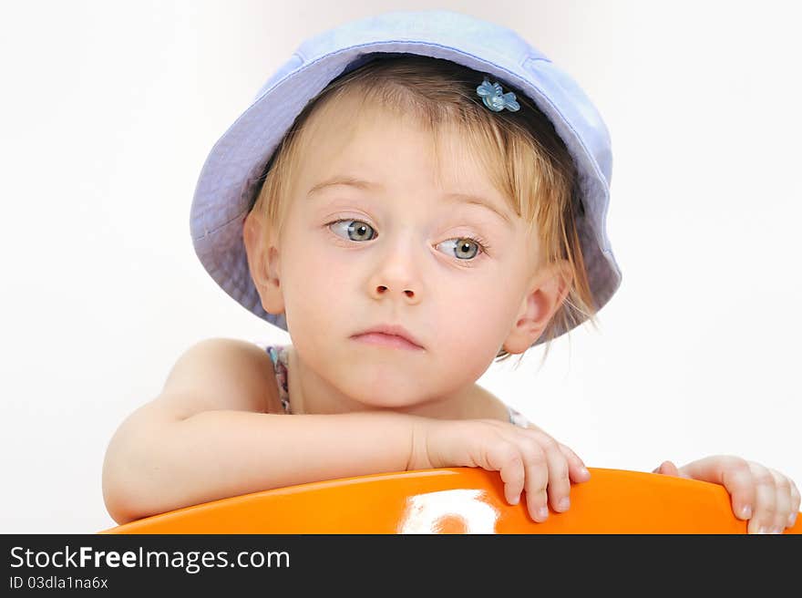 Fashion little girl in studio isolated on white