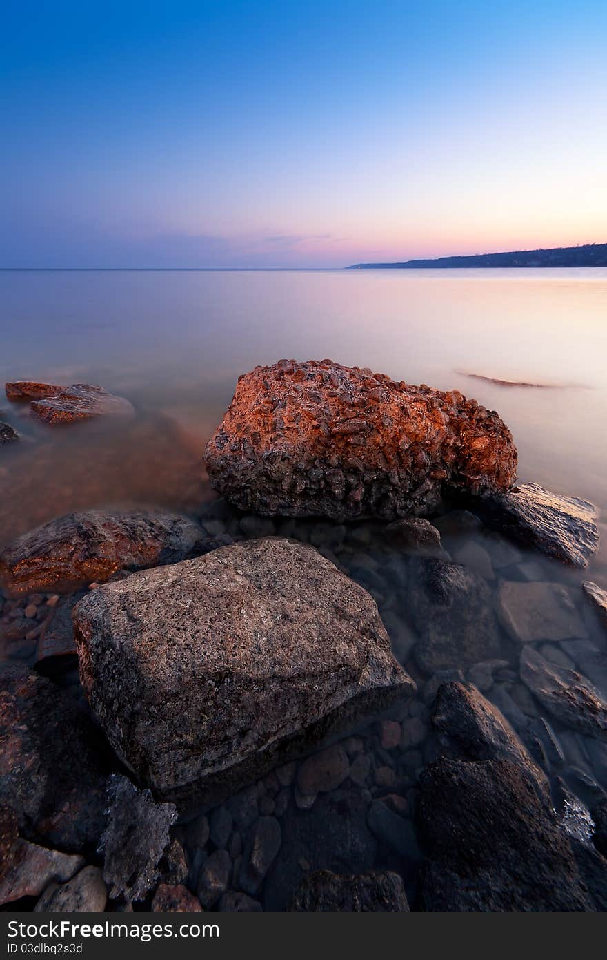 Sunset on the rocky coast