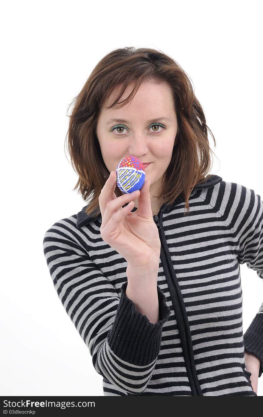 Young woman creating traditional easter eggs. Young woman creating traditional easter eggs