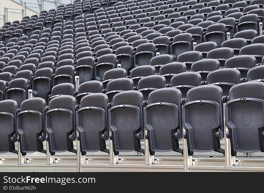 Rows of chairs on an outdoor stage. Rows of chairs on an outdoor stage.