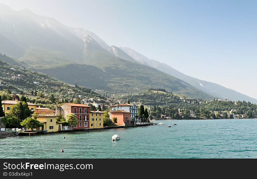 Malcesine from the lake with mountain slopes in the background