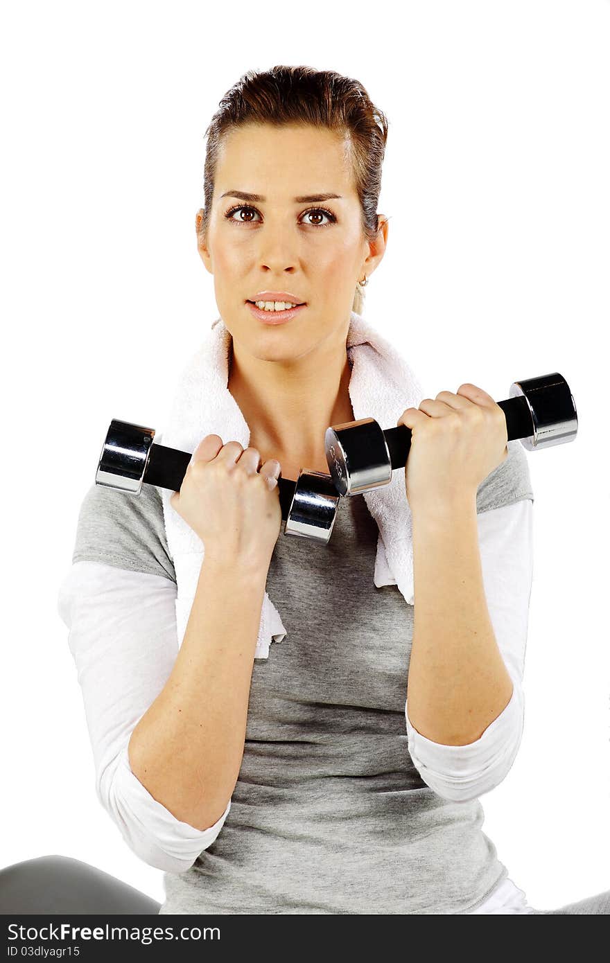 Girl exercising with weights, closeup 2