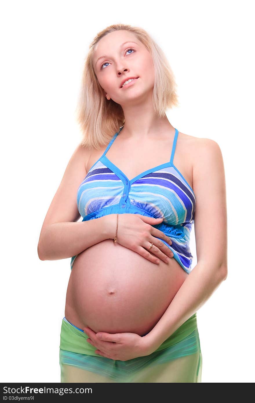 Beautiful young pregnant blonde woman in studio. Beautiful young pregnant blonde woman in studio