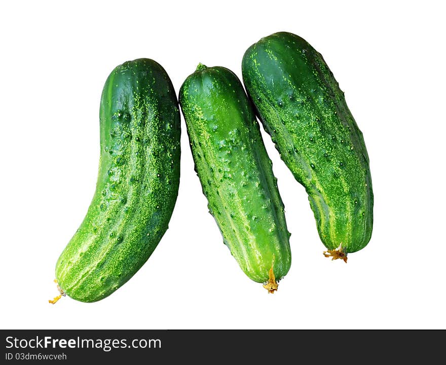 Cucumbers over white