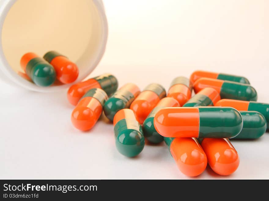 Orange - green capsules