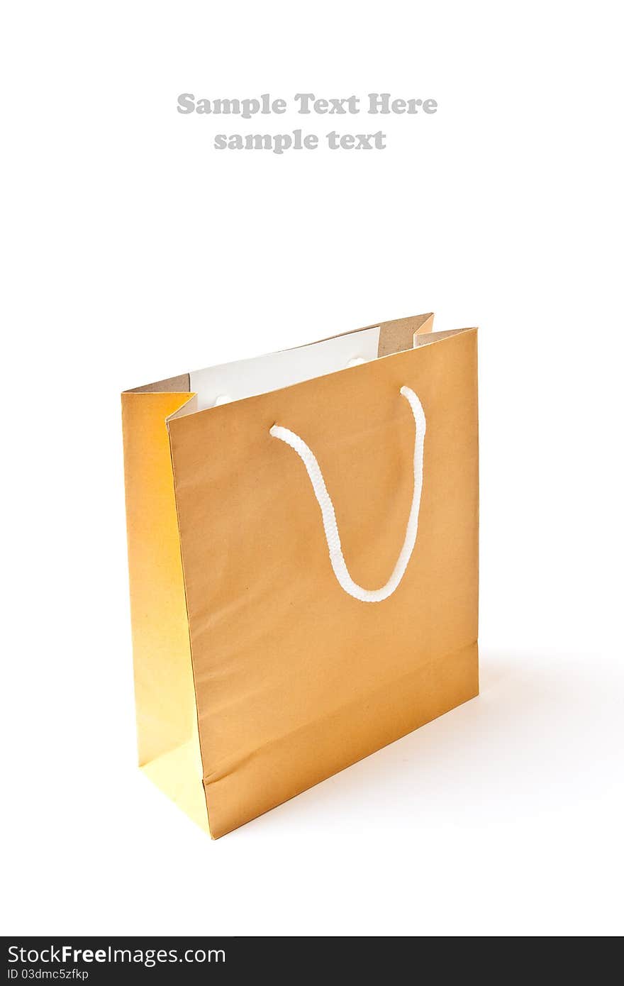 Brown shopping paper bag isolated on white background