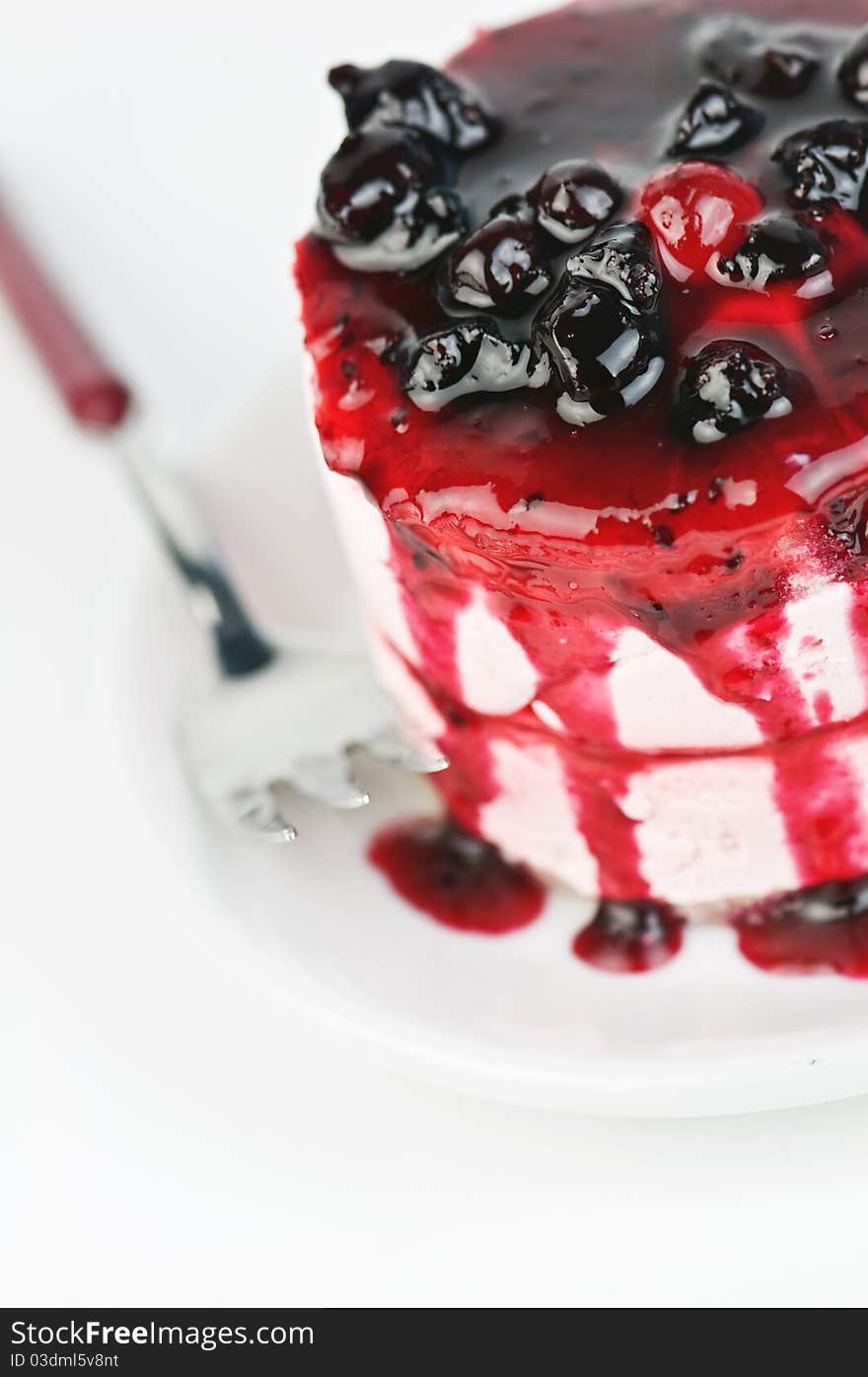 Cake with blackberry jam closeup