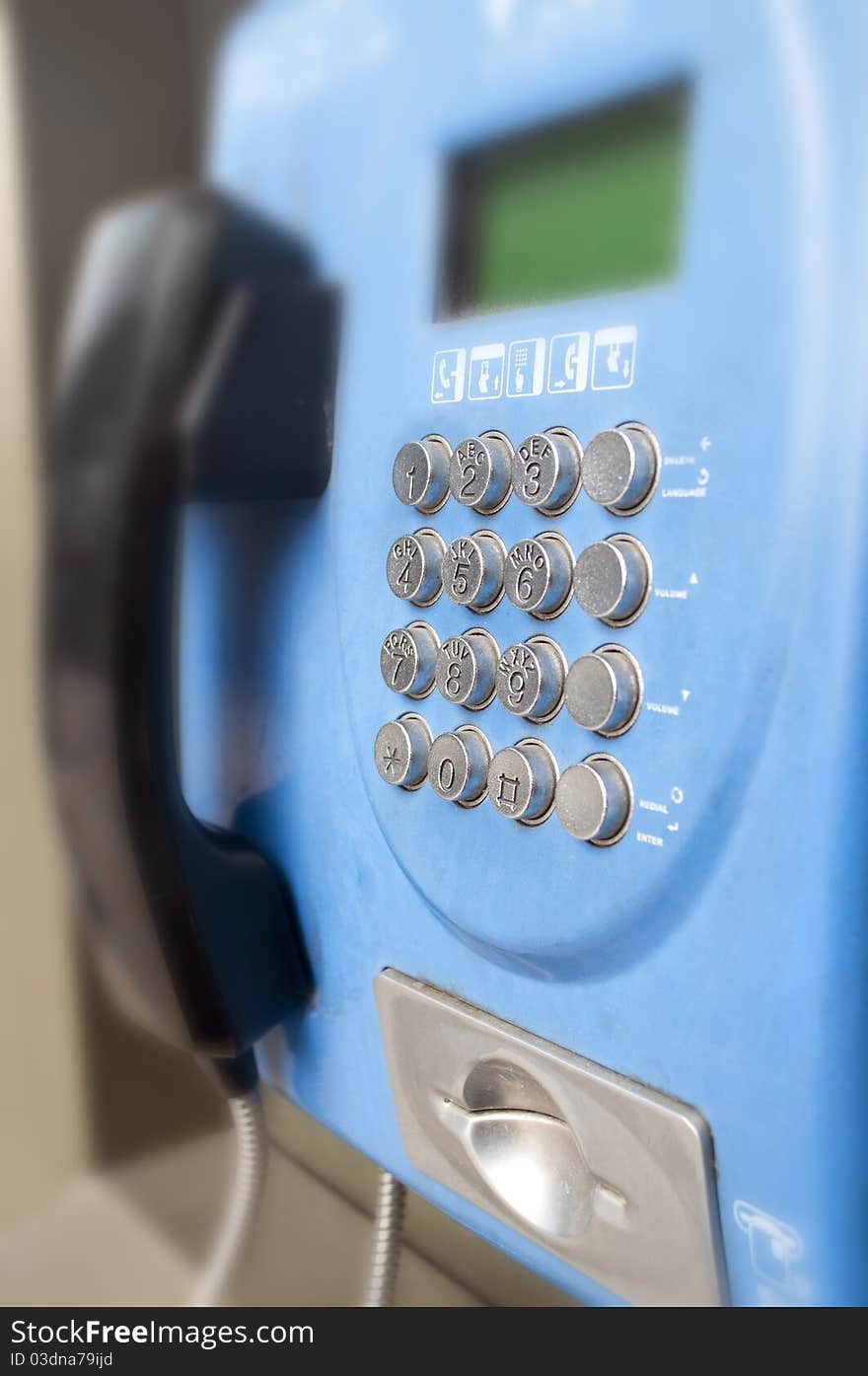 The blue color public telephone.