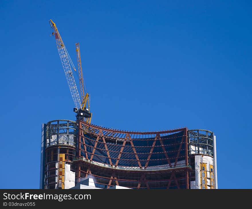 Famous tall skyscraper during the construction phase, Calgary, Alberta, Canada. Famous tall skyscraper during the construction phase, Calgary, Alberta, Canada