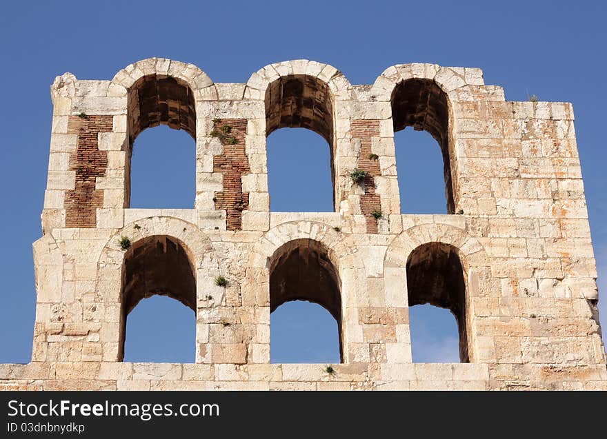 Exterior part of ancient theater of Acropolis aka Odeon of Herodes Atticus. Theatre structure located on the south slope of the Acropolis of Athens, built in 161 AD by Herodes Atticus.