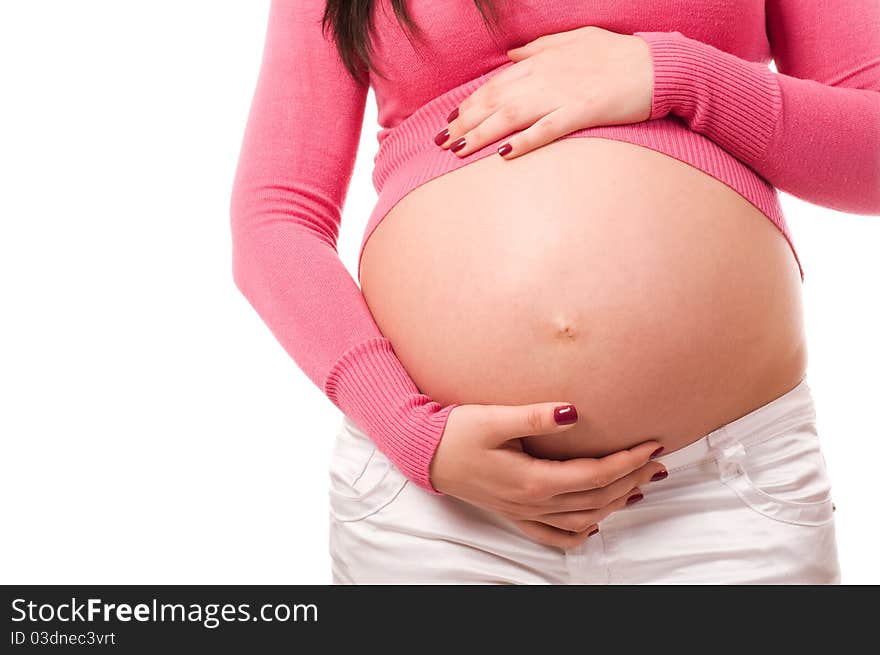 Pregnant woman holding belly