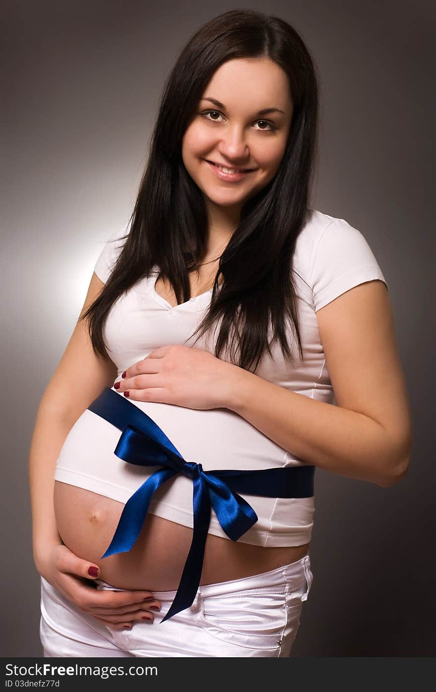 Portrait of joyful beautiful pregnant woman