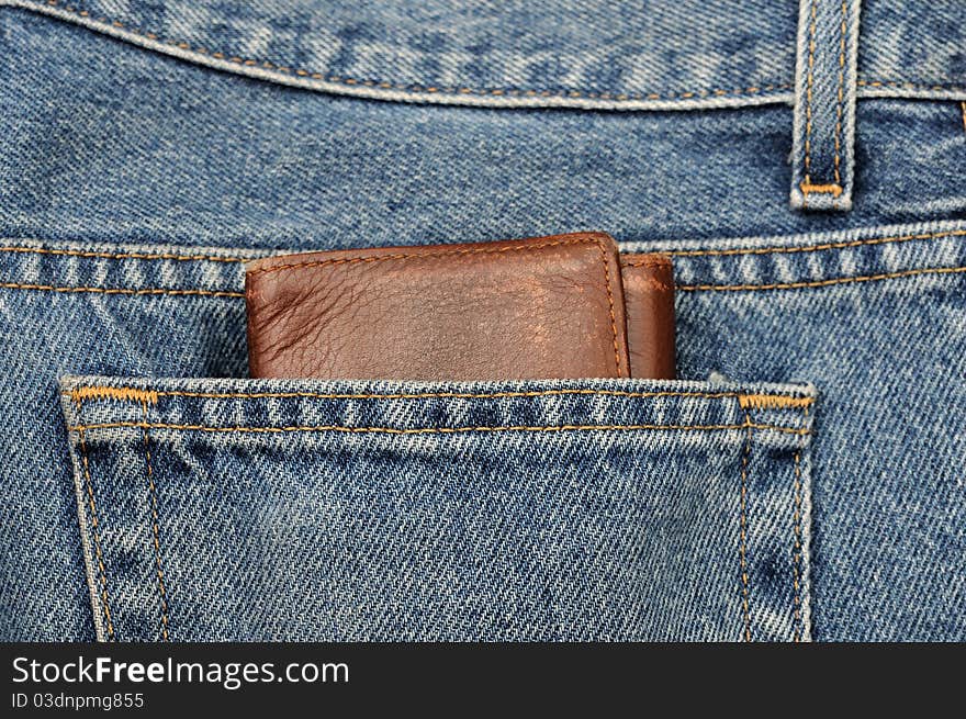 A clean blue jeans with wrench in the back pocket