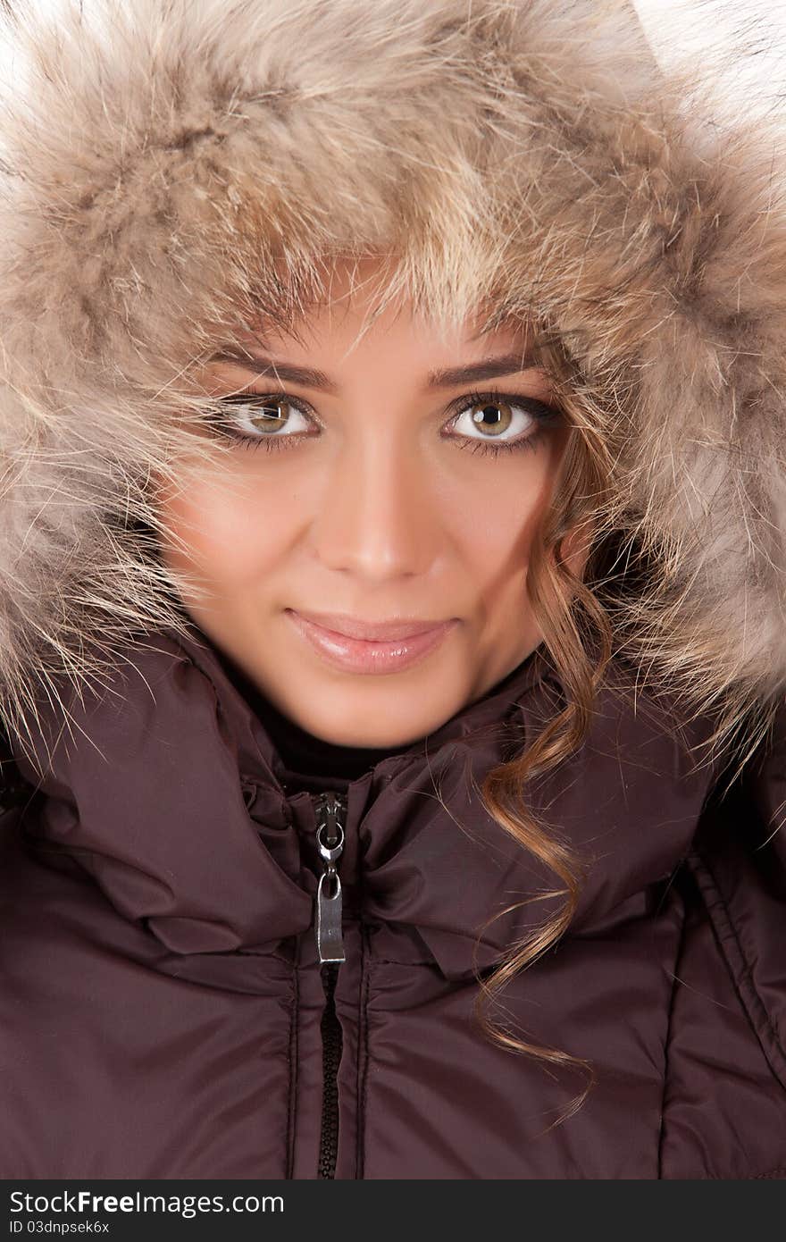 Young woman in fashionable clothing on isolated baclground