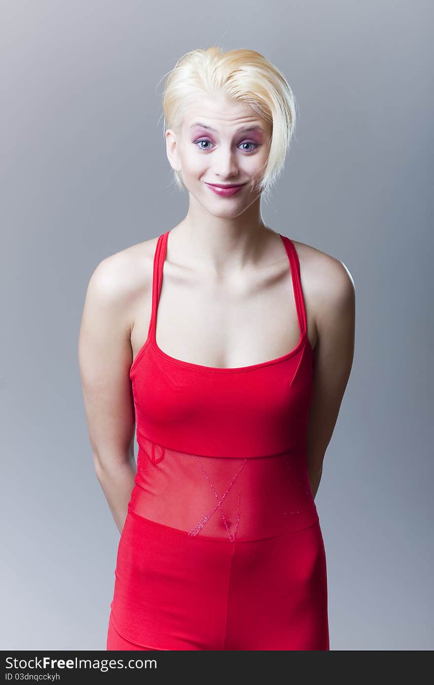 Beautiful sensual blond girl in red clothes. Beautiful sensual blond girl in red clothes