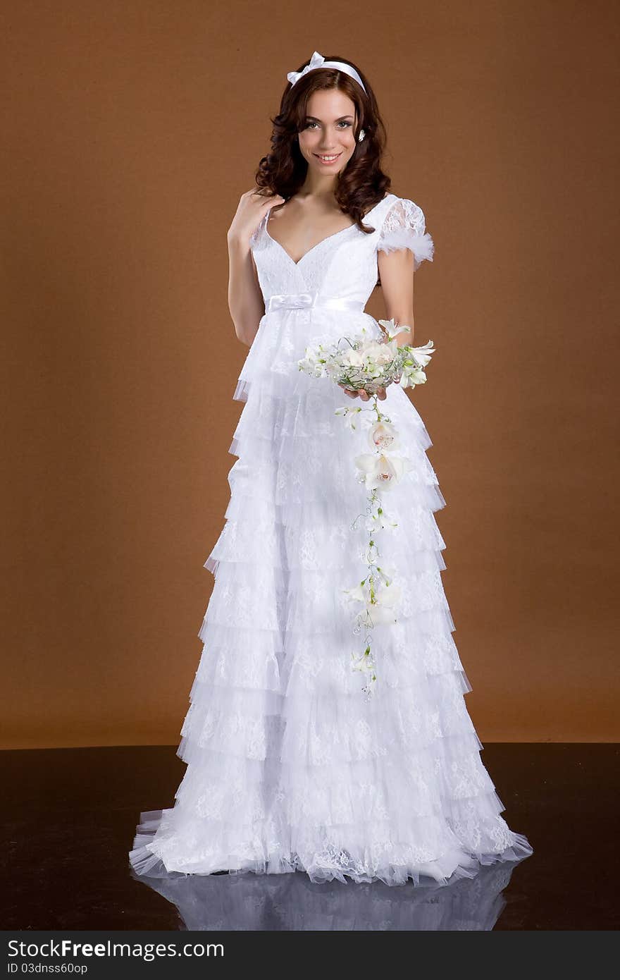 Young woman in wedding dress. Young woman in wedding dress