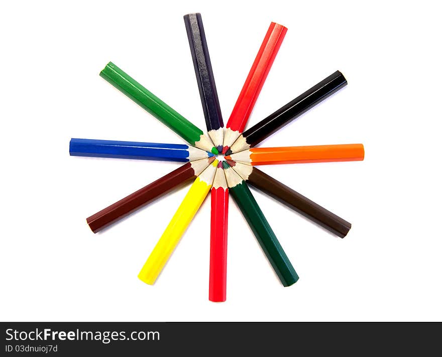 Tracery of colored pencils on white background. Tracery of colored pencils on white background