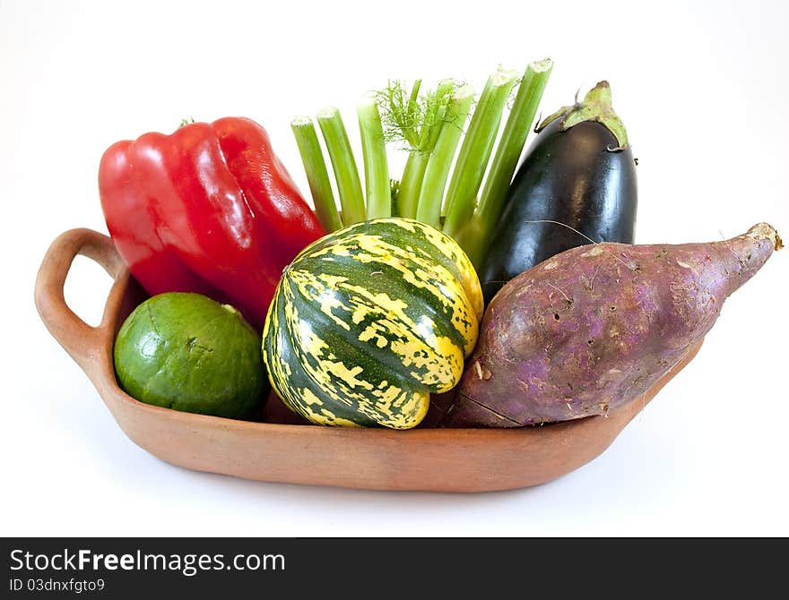 Earthenware dish with various vegetables