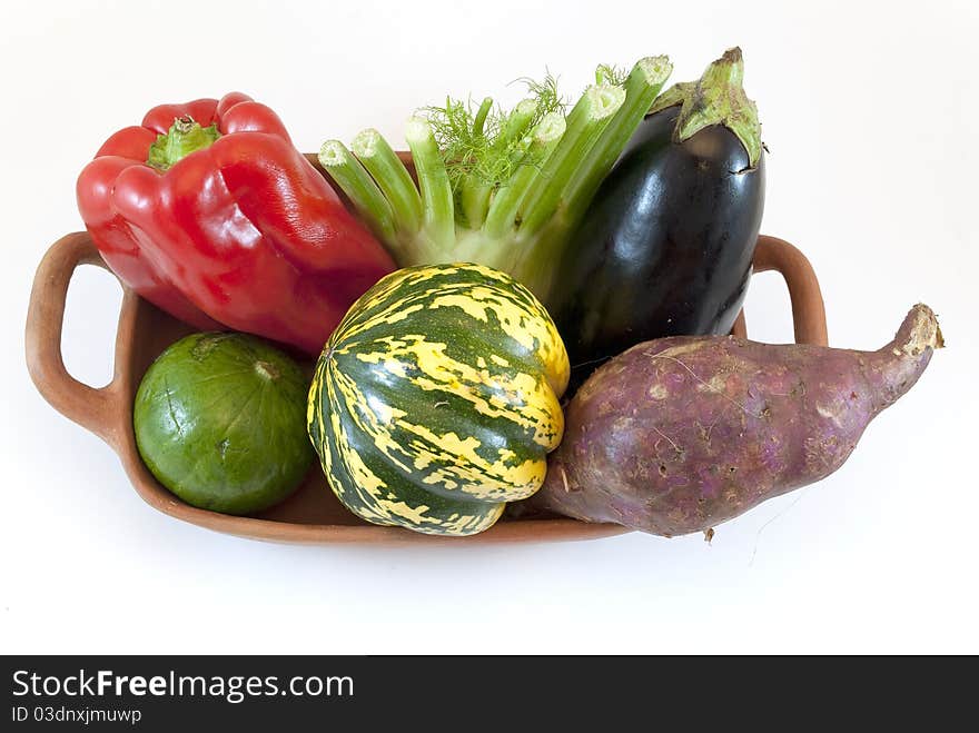 Earthenware dish with various vegetables