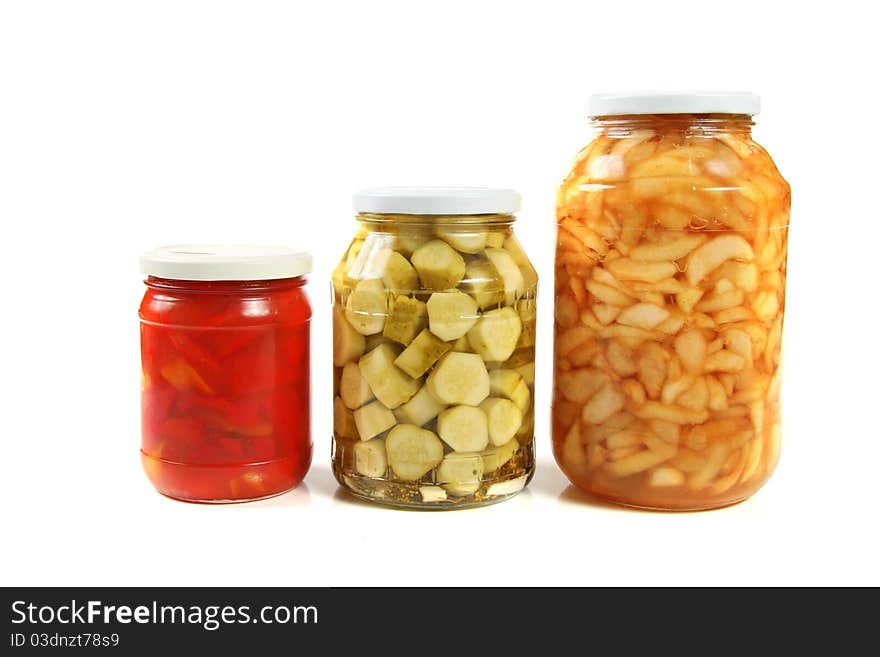 Three jars of pickled vegetables