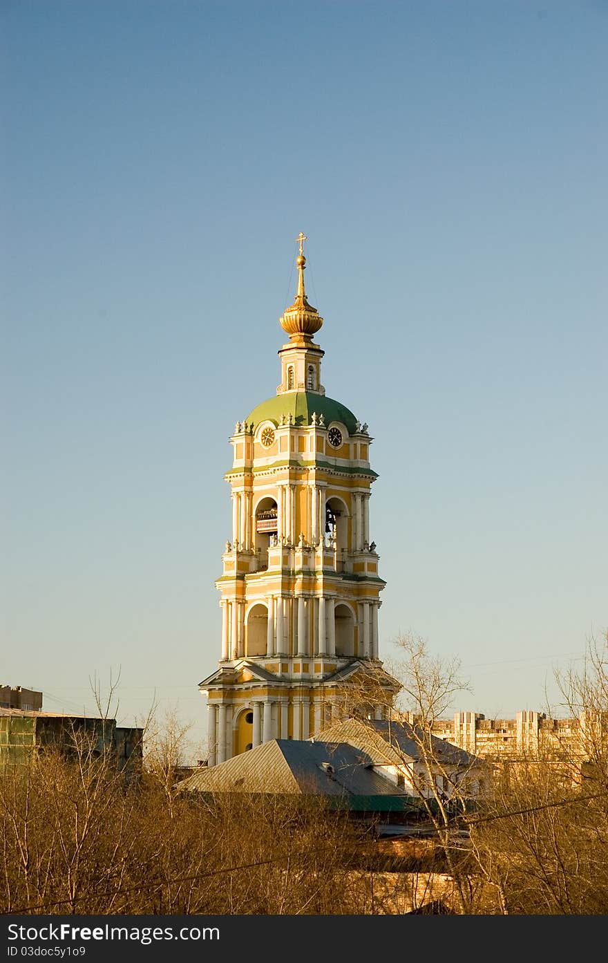 Belfry of the Novospassky monastery at sunset