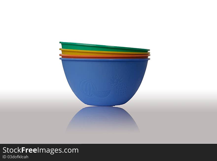 Colorful bowls on white background